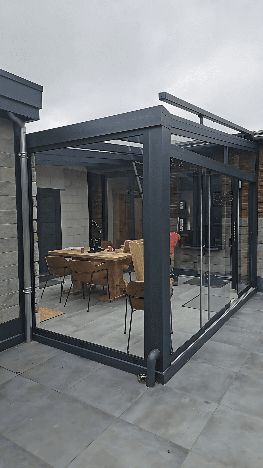 Luxe aluminium veranda met glazen schuifwanden | Veratuin
